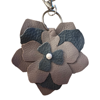 Gray and blue layered leather flower keychain with silver tone ring and lobster clasp